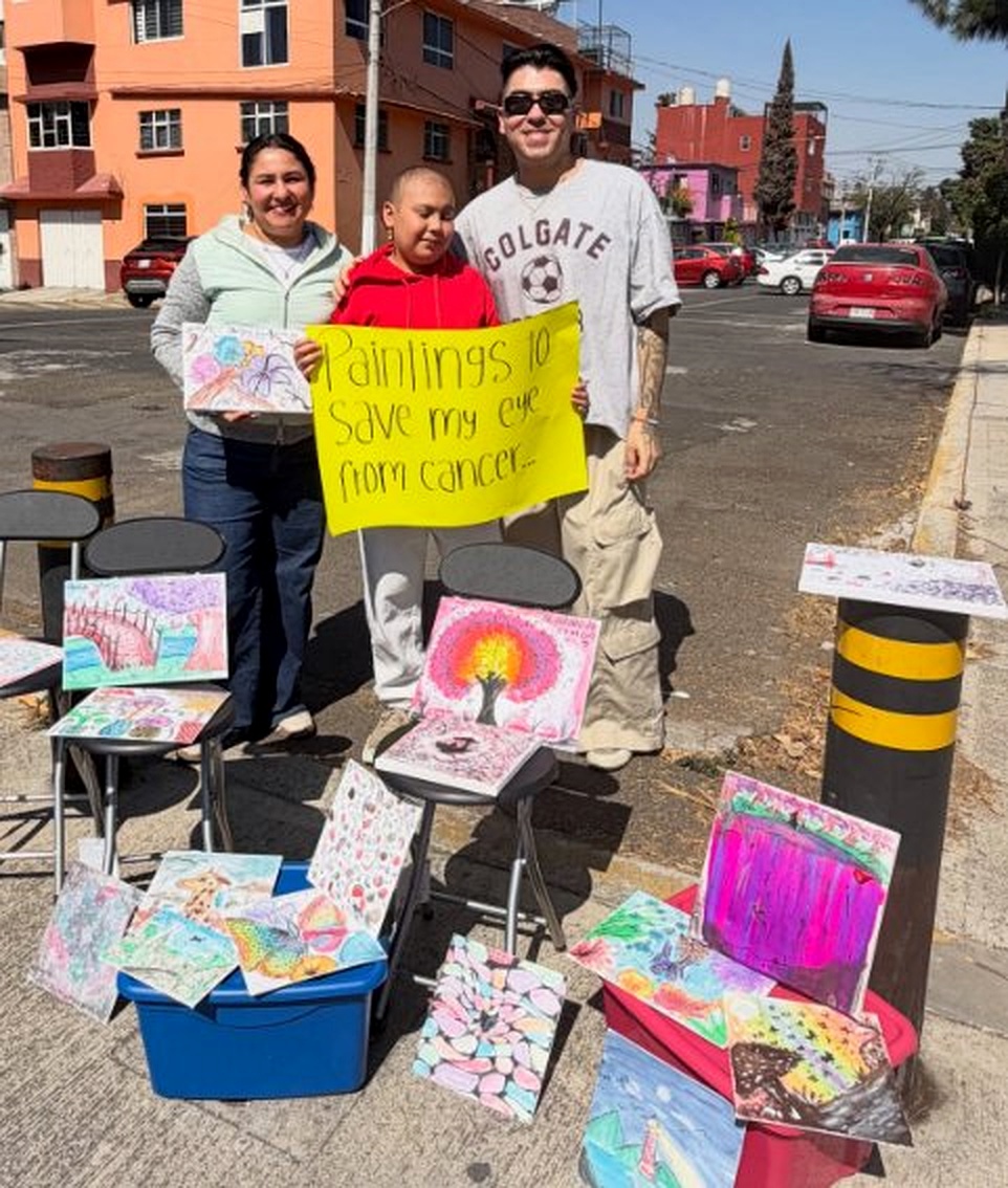 Arlett with her family and paintings